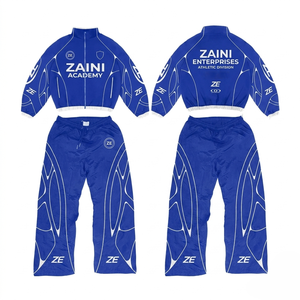 Traje cortavientos para mujer y hombre, 125GSM, tela de poliéster Taslon, azul real, diseño de paneles en contraste, impresión personalizada por transferencia de calor. - Product Image 1