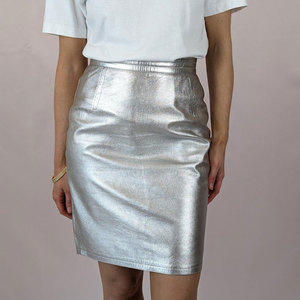 Mini-jupe en cuir PU brillant très tendance, couleur unie, ajourée, à franges, à lacets, extensible et sexy pour femme - Product Image 1