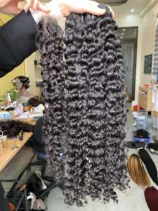 Vietnamesehairluxury 100% Extensions de perruques de cheveux vierges bouclés eurasiens non transformés de grade A Remy du Vietnam - Product Image 3