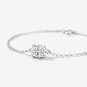 Pulsera de Plata de Ley Rhodia Rhaya Jewels con Zirconia Ovalada Clásica Solitaria y Engaste de Garra para Niños - Product Image 1