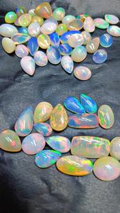 โอปอลเอธิโอเปียคุณภาพสูง AA แบบธรรมชาติ ทรงคาโบชอง เอเมอรัลด์คัท หลายสี 2-3 กะรัต ขนาดฟรีไซส์ พลอยหลวมสำหรับทำเครื่องประดับ - Product Image 3