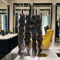 Cheveux bruts ondulés à cuticule alignée Fournisseur en gros indien et distribution aux États-Unis Extensions de cheveux naturels ondulés