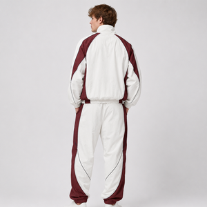 Survêtement color block de haute qualité avec logo brodé personnalisé, veste coupe-vent imperméable à fermeture éclair intégrale et pantalon de survêtement à empiècements contrastants - Product Image 3