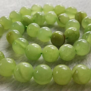 ลูกปัดหยกเขียวมาเลย์ทรงกลมเรียบเนียนสำหรับทำเครื่องประดับ DIY ขายส่ง - Product Image 1