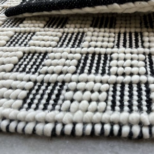 Handloom Wool Black & Ivory Geometric <b>Rug</b> <b>Pebble</b> Texture Eco-Friendly Non-Slip Artisan Woven for Modern Contemporary Interiors - Product Image 6