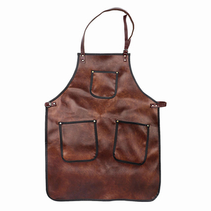 Delantales de Barbería y Salón al por Mayor, OEM, ODM, de Cuero y Tela Resistente, Elegantes, Ajustables, para Uso en Salón - Product Image 1