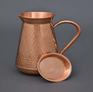 Ornate floral carved <b>copper</b> water pitcher with brass <b>handles</b>, available at wholesale prices and made in India. - Product Image 3