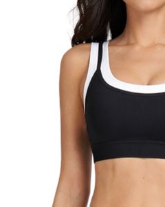 Ensemble de sport personnalisé pour femme : soutien-gorge contrastant noir et blanc et pantalon évasé taille haute extensible pour yoga, fitness et gym – Vente en gros OEM personnalisée - Product Image 4