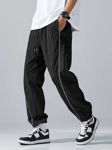 Pantalones Holgados Blancos para Hombre con Paneles Negros, Cintura Ajustable con Cordón, Estilo Moderno y Personalizado, Talla Grande - Product Image 3