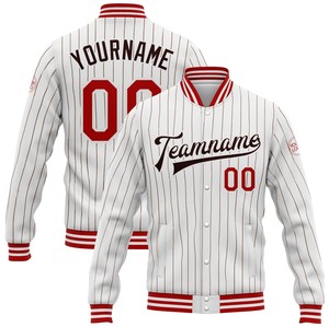 Chaqueta Varsity Personalizada de Invierno para Hombre, Marca Athletic International, con Nombre y Número Bordados en la Parte Delantera, 100% Algodón Antibacteriano, Cuello Alto - Product Image 1