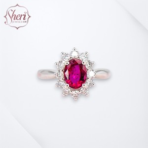 Anillo de Oro Blanco Sólido de 18K para Mujer, con Rubí de Corte Brillante y Halo de Diamantes, Diseño Diana Ovalado, de Sheri Jewels, para Fiestas y Eventos - Product Image 1