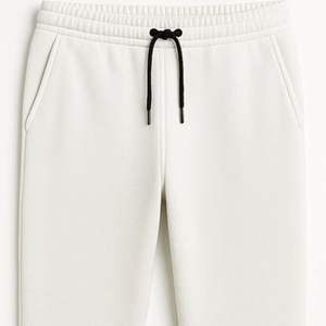 กางเกงวอร์มผ้าฝ้ายผสมไนลอนสั่งตัดไซส์ได้ แห้งเร็ว ไม่ยับ ไม่เป็นขุย ดีไซน์ทรงคาร์โก้ขาบาน รับผลิตแบบ OEM ODM - Product Image 1