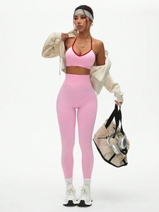 Conjunto de Yoga Rosa sin Costuras al por Mayor Personalizado, Dos Piezas: Sujetador Deportivo y Leggings de Cintura Alta para Fitness, Gimnasio y Entrenamiento - Fabricante de Ropa Deportiva - Product Image 1
