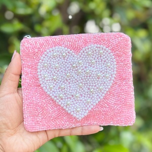 Top quality Embroidery beaded <b>coin</b> <b>purse</b> features a white pearl heart design to organize and <b>coin</b> carry small personal essential - Product Image 1