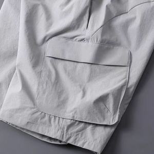 Shorts cargo pour homme, taille élastique, séchage rapide, décontractés, couleur unie, tissu Oxford, polyester - Product Image 5