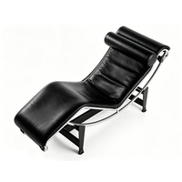 Chaise longue moderne en cuir noir avec appui-tête et structure métallique pour la maison, le bureau, le hall d'hôtel, le salon, la zone VIP