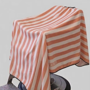 Bata de Barbero Impermeable de Poliéster Blanco Melocotón con Detección de Agujas y Fusión sin Costuras Unisex - Product Image 1