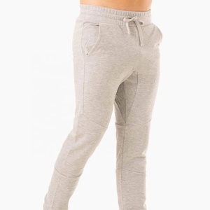 Pantalon de jogging décontracté pour homme, taille mi-haute, devant plat, boutonné, séchage rapide, style streetwear, idéal pour la course et le fitness, tendance hiver - Product Image 1
