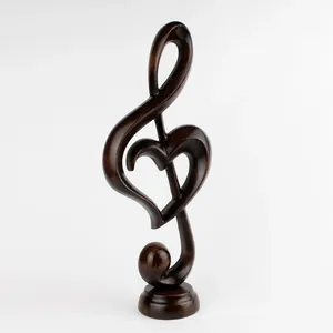 Adorno musical abstracto tallado en madera oscura con diseño de corazones y notas entrelazados para decoración estética de estudio en casa. - Product Image 3
