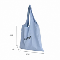 Sac fourre-tout décontracté en toile à rayures et lettres grande capacité 2026, nouveau style coréen polyvalent, simple et original, à porter à l'épaule