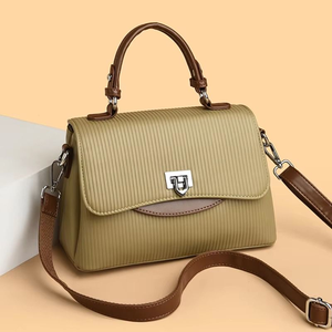 Classic tan leather <b>tote</b> <b>with</b> a circular handle and gold stirrup hardware. Polished look available at wholesale prices. - Product Image 4