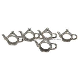 Rond de serviette en métal stocké Conception de théière - Product Image 1