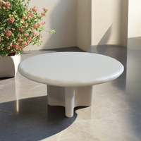 Table basse ronde minimaliste en résine avec base irrégulière, design moderne pour la maison, l'appartement, le salon