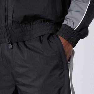 เสื้อแจ็คเก็ตกันลมวินเทจสำหรับผู้ชาย TITAN TREAD WEAR รุ่นคัสตอม พร้อมชุดเซ็ตแทรคสูทซอฟต์เชลล์ 2 ชิ้น แบบมีซิป ผ้าคอตตอน 100% คุณภาพสูง - Product Image 4