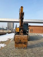Excavatrice sur pneus SANY SY155W Pro d'occasion, modèle 2023, avec moteur ISUZU 4HK1X, puissance de 128 kW, poids opérationnel de 15 000 kg, bonne efficacité