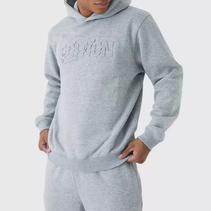 Conjunto de chándal de algodón personalizado con dobladillo sin rematar, patchwork de otoño, sudaderas con capucha y pantalones de chándal acampanados con diseño en relieve - Product Image 1