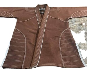 ชุดยูนิเซ็กซ์คุณภาพสูงสำหรับคาราเต้  ชุดยูนิฟอร์มศิลปะการต่อสู้พร้อมโลโก้แบบกำหนดเอง - Product Image 1