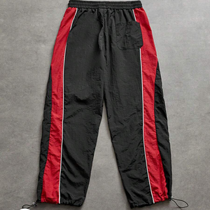 Pantalones de chándal de nailon con botones personalizados estilo urbano para hombre, venta al por mayor directa de fábrica, de pierna ancha acampanada, cortavientos - Product Image 5