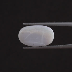 โอปอลสีขาวธรรมชาติคุณภาพดี รับรองโดย IGI พลอยเม็ดเดี่ยว 3.95 กะรัต รูปไข่ 14x9.5 มม. ตัดด้วยมือ ขัดเงา ผ่านการเคลือบด้วยแว็กซ์/น้ำมัน - Product Image 1