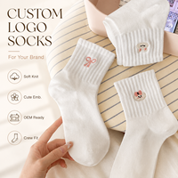 Chaussettes de football personnalisées à forte valeur ajoutée Chaussettes à prise en main d'usine Chaussettes antidérapantes