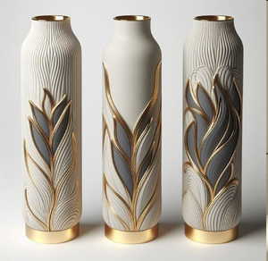 Elegant textured cream-white cylinders featuring striking dark metallic leaf patterns, available at wholesale prices. - Product Image 1