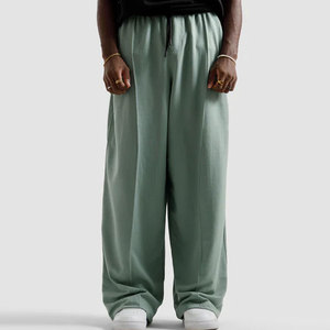 Pantalon ample tendance pour homme, coupe large et décontractée, taille ajustable avec cordon de serrage, tissu tissé lisse, style streetwear décontracté - Product Image 1