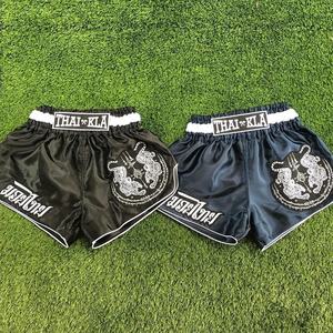 กางเกงมวยไทยคุณภาพสูงสำหรับผู้ชาย ระบายอากาศได้ดี เหมาะสำหรับฝึกซ้อมศิลปะการต่อสู้ สีดำ กางเกงฝึกซ้อมแบบไทย - Product Image 3