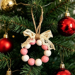 Décoration murale de Noël nordique faite à la main, ornement bohème coloré tissé pour un intérieur festif - Product Image 1