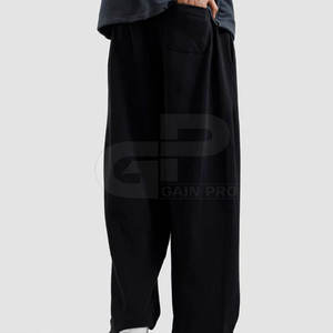 Pantalones deportivos anchos para hombre, de tela elástica cómoda, ideales para entrenamientos en el gimnasio, correr y uso diario. - Product Image 5