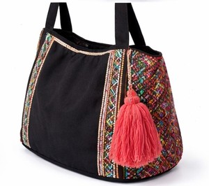 Bold <b>black</b> tote <b>bag</b> with intricate starburst beadwork, colorful side panels, and tassel accent. Perfect statement handbag - Product Image 6