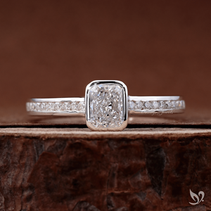 Delicate 0.50ct radiant cut lab grown diamond <b>ring</b> bezel <b>set</b> minimalist engagement <b>ring</b> with channel band in 10k white gold - Product Image 1