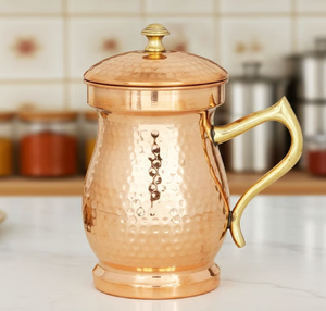 Ornate floral embossed <b>copper</b> jug features a premium matching <b>handle</b> and pedestal base, available at wholesale price. - Product Image 3