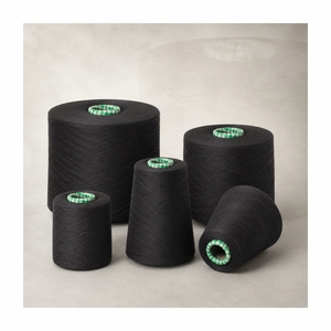 Fil de coton 100% ring-spun teint noir pour le tissage textile, absorbant l'humidité, fabriqué en Inde. - Product Image 1
