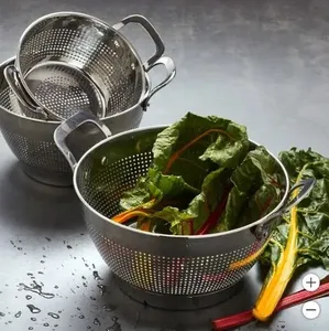 Large <b>stainless</b> <b>steel</b> <b>colander</b> with large holes for quick draining pasta and vegetables during daily kitchen cooking tasks - Product Image 2