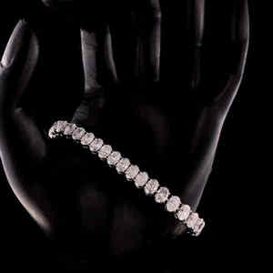 Bracelet tennis classique en diamants taille brillant ronds, serti en canal, bijoux fins pour femme, style mariage - Product Image 1
