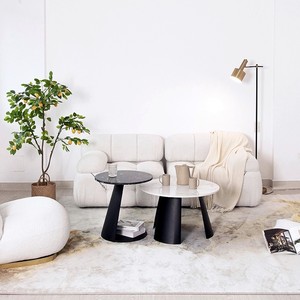 Table basse ronde moderne de luxe avec base sculpturale artistique noire pour les espaces d'hôtel et de maison - Product Image 4