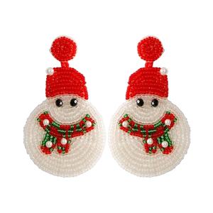 ต่างหูปักลูกปัดทำมือสีแดงและสีขาว ดีไซน์ตุ๊กตาหิมะสวยงาม สำหรับเด็กผู้หญิง จากประเทศอินเดีย - Product Image 1