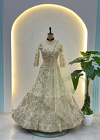 LEHENGA CHOLI DE DISEÑO CON RED DE MARIPOSAS, LENTEJUELAS Y BORDADO CODIFICADO CON DUPATTA Beige 84522