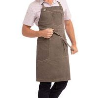 Tablier en toile de coton personnalisable avec poches pour outils, bretelles réglables, idéal pour la cuisine, la pâtisserie, le barbecue, les ateliers et les activités artisanales.