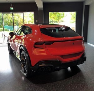 USED F_errari Purosangue is a four-door four-seater performance vehicle <b>powered</b> by a naturally aspirated 6.5-liter V12 engine - Product Image 4